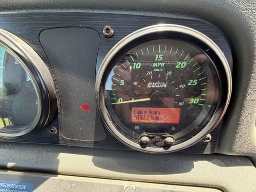 Engine hour meter showing 5,182.7 hours on a 2015 Elgin Pelican NP